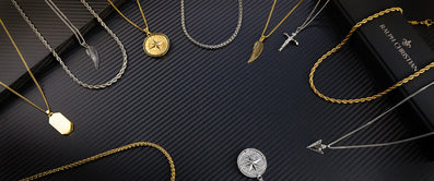 A collection of necklaces and pendants laid out