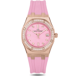 The Celeste - Rose Blush features a bold rose gold case with a pink textured dial, cubic zirconia hour markers, a date window, and a matching pink silicone strap with a sapphire-coated crystal.