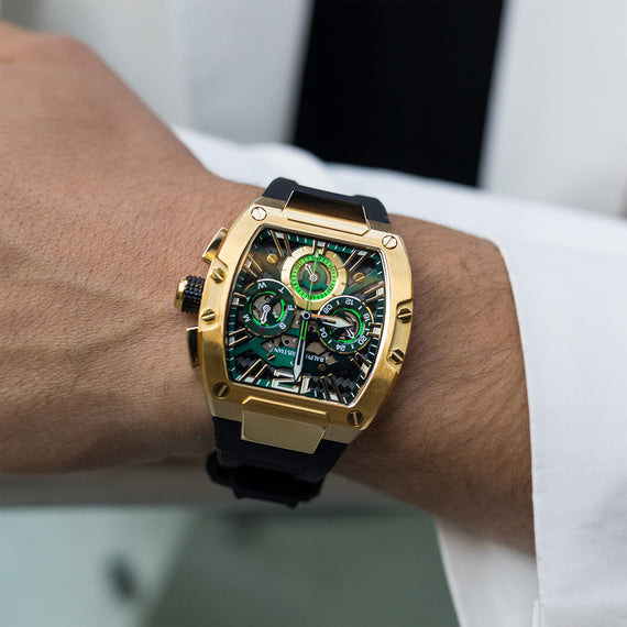 The Intrepid Sport - Gilded Black men's luxury watch featuring a bold gold-tone case, black strap, and intricate dial with 24-hour subdial, day, and date functions.
