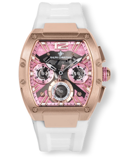 Ralph Christian rose gold watch with a pink layered dial, three visible subdials, bold hour markers, screw details, and a white rubber strap