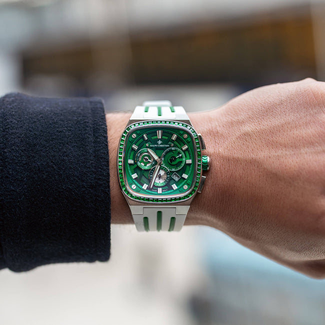 The Legacy Chrono Ice - Emerald Glacier men's luxury watch features a bold green dial with chronograph subdials, date function, and a white and green strap, embodying statement luxury bold by design.