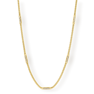 The Atlas Ice Necklace features a bold men's gold chain accented with rectangular cubic zirconia-set links, designed as a statement luxury jewelry piece.