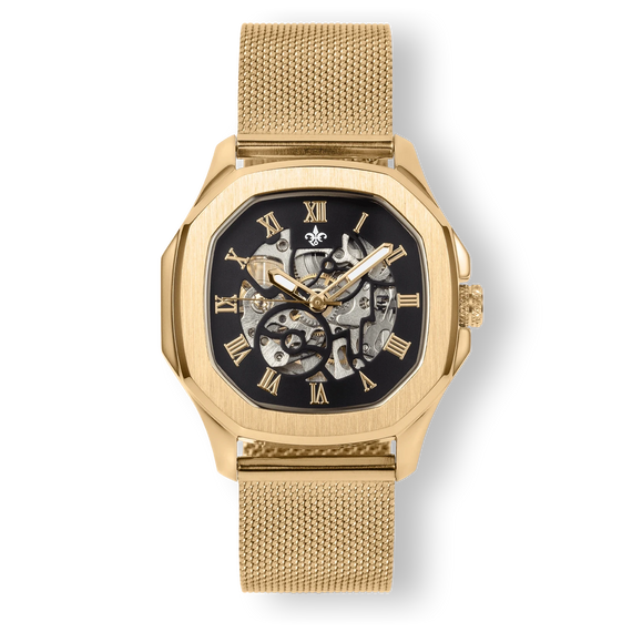 The Ava Automatic - Ladies - Gold featuring a gold mesh strap, a gold square case with rounded edges, and a partially skeletonized black dial with gold Roman numeral hour markers and gold hands, showcasing intricate watch mechanism details.