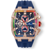 The Polaris Chrono Ice - Celestial Nova men's luxury watch features a rose gold-tone case with a rainbow gradient of cubic zirconia stones set on the bezel, a deep blue textured dial with red and white chronograph subdials, date function, and a blue silicone strap, combining bold design and statement watch craftsmanship.
