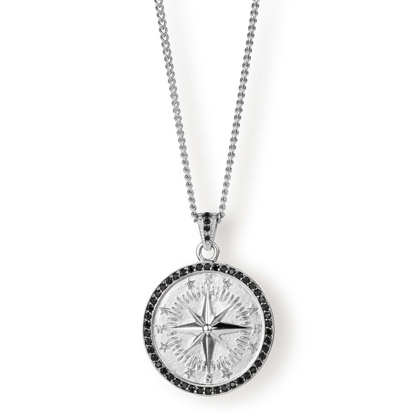 The Compass Essentials Bundle - Silver features a bold men's pendant necklace with a detailed compass design in silver and a black stone-studded border, suspended from a matching silver chain.
