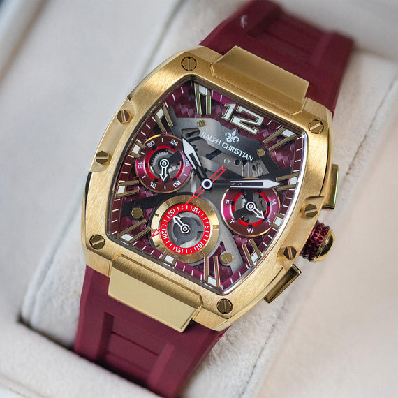 The Intrepid Sport Ladies - Scarlet Gold women's luxury watch with a gold tonneau case detailed red dial three chronograph subdials and red rubber strap