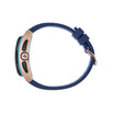 A close-up side view of a smartwatch with a navy blue silicone strap and a rose gold case, featuring a black bezel and a turquoise accent ring.