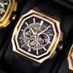 Luxury watch with rose gold and black design on a dark background