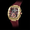 The Intrepid Sport Ladies - Scarlet Gold gold-tone statement watch with burgundy strap and detailed dark dial featuring three subdials and bold numeral markers