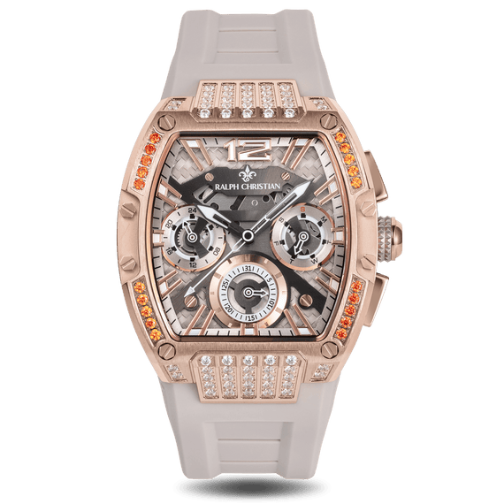 Ralph Christian rose gold tone statement watch with a white strap, crystal accented case and bezel, and detailed dial with three subdials