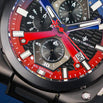 Close-up of a Ralph Christian watch with red and blue accents