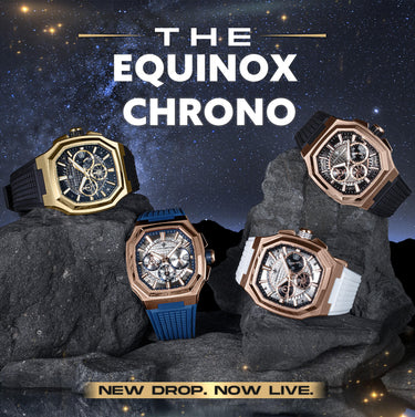 Four watches on rocks with a starry night sky background