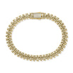 Gold bracelet with diamond accents on a white background