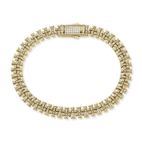 Gold bracelet with diamond accents on a white background